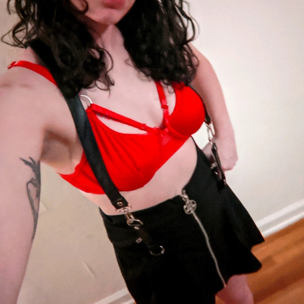 Black mini skirt with suspenders